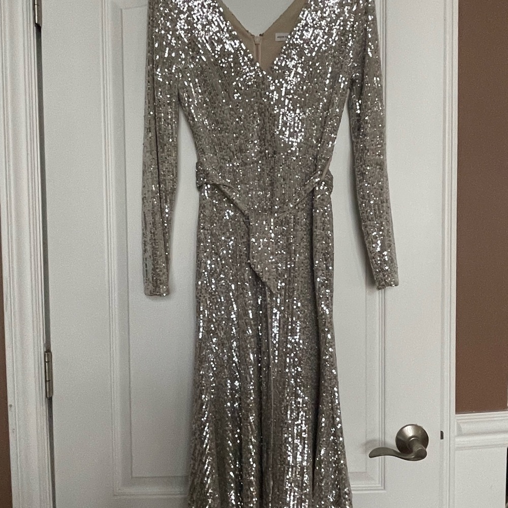 Silver Metallic “wrap look” dress with tie belt.